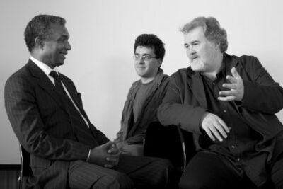 Corsino Fortes with his translators,&nbsp;Daniel Hahn and Sean O'Brien, backstage at the British Library.